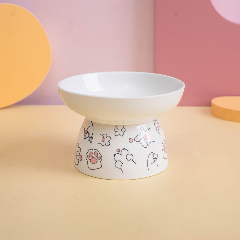 https://www.petzo.net/wp-content/uploads/2023/09/Cartoon-Prints-Ceramic-Raised-Cat-Dog-Bowl-Flat-Pink-min.jpg